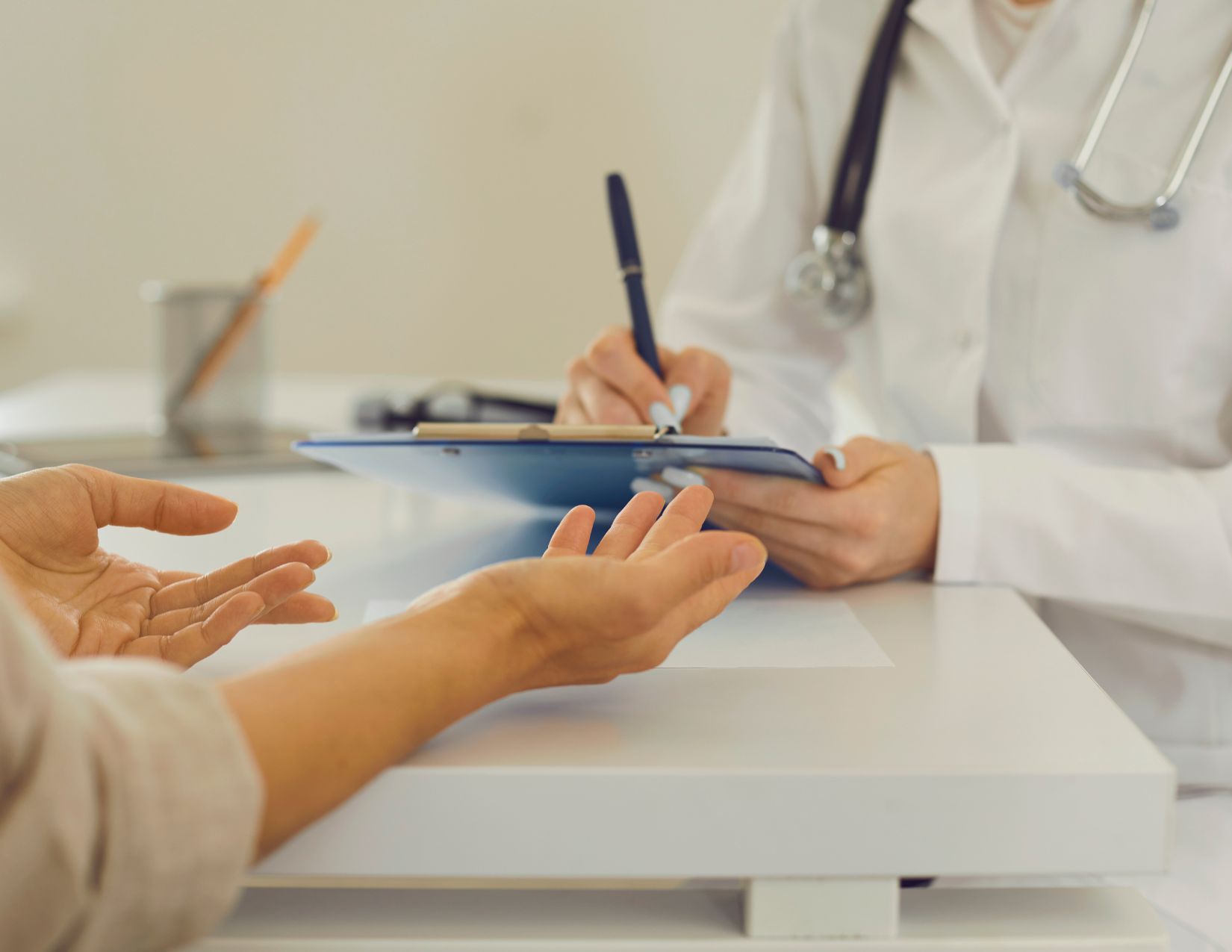 Healthcare professional working with a patient