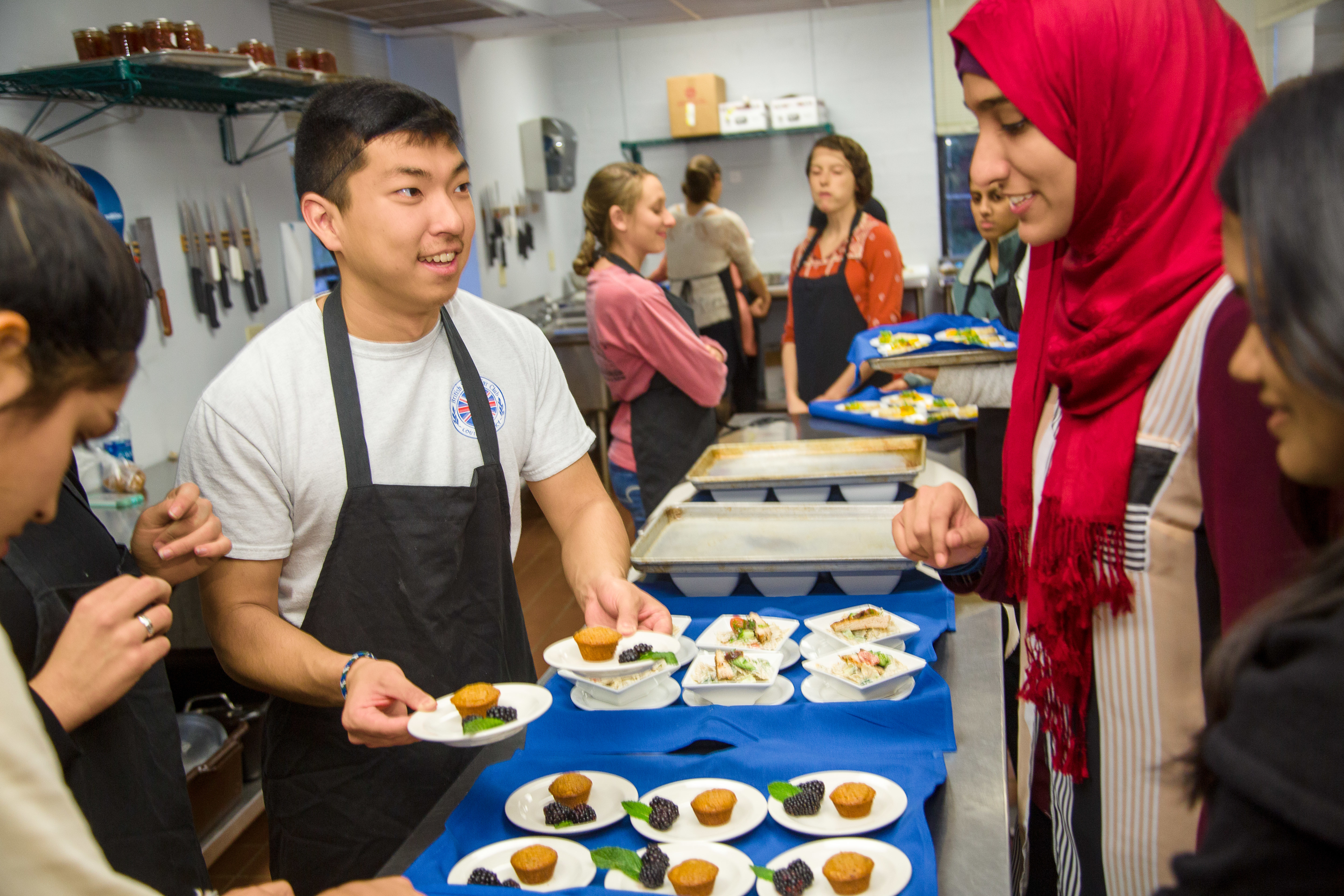 Students serving food